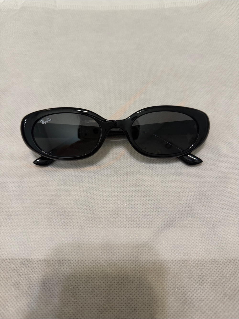 Ray-Ban RB 4441D Women’s Black Oval Sunglasses with Dark Lenses